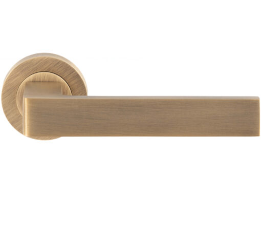 Sasso Door Handles On Round Rose, Antique Brass (Sold In Pairs)